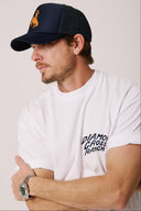 Branded Wyo Cowboy Trucker